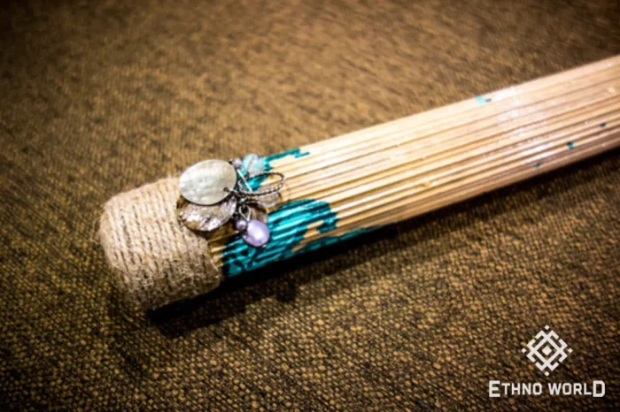 Rainbow flute rainstick made from a plant