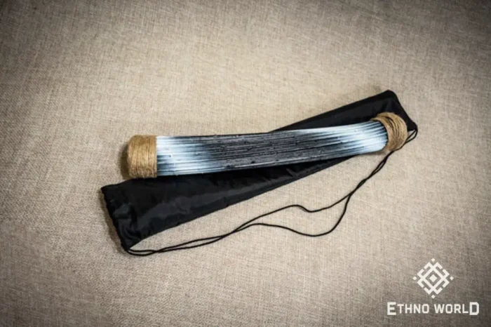 Rainbow flute rainstick made from a plant