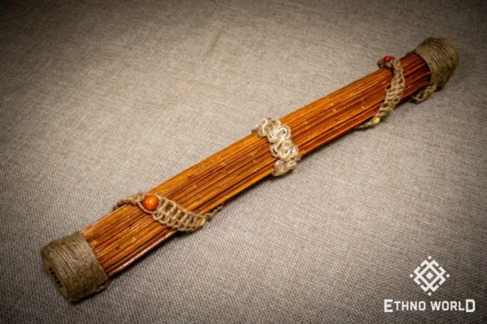 Rainbow flute rainstick made from a plant