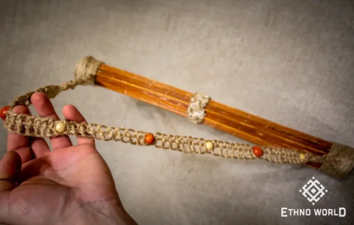 Rainbow flute rainstick made from a plant
