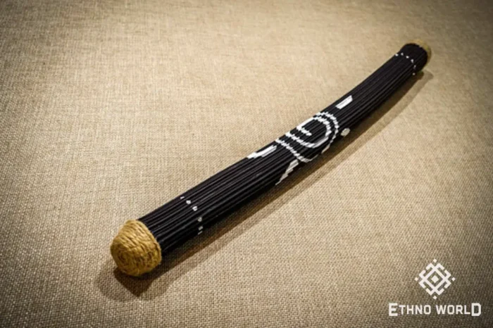 Rainbow flute rainstick made from a plant