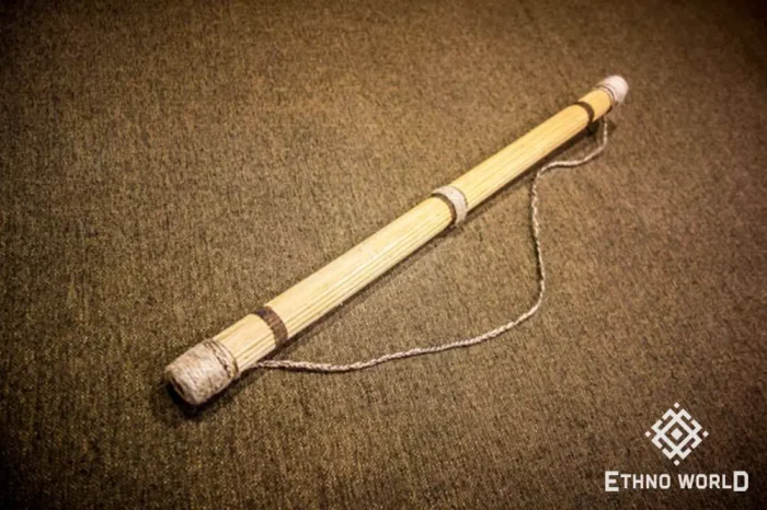 Rainbow flute rainstick made from a plant