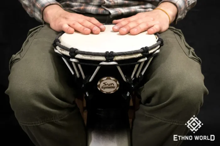 Djembe Sun 10″ - a wooden percussion drum with key tuning and leather membrane