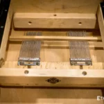 Foldable percussion drum with snare adjustment and castanet in a wooden body, handmade, view from all sides (disassembled and assembled cajon)