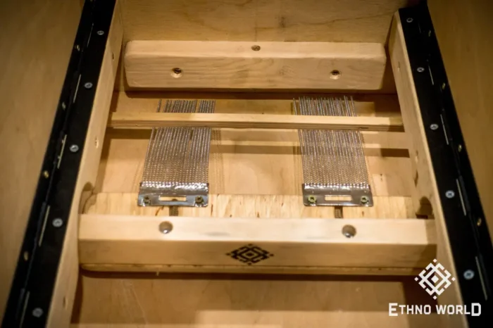 Foldable percussion drum with snare adjustment and castanet in a wooden body, handmade, view from all sides (disassembled and assembled cajon)