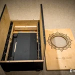 Foldable percussion drum with snare adjustment and castanet in a wooden body, handmade, view from all sides (disassembled and assembled cajon)