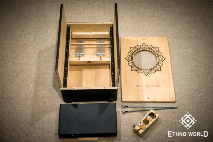 Foldable percussion drum with snare adjustment and castanet in a wooden body, handmade, view from all sides (disassembled and assembled cajon)