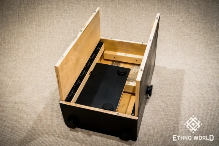 Foldable percussion drum with snare adjustment and castanet in a wooden body, handmade, view from all sides (disassembled and assembled cajon)