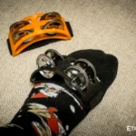 Spider percussion tambourine with foot mounting