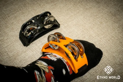 Spider percussion tambourine with foot mounting