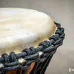 Sun 12″ Djembe – a handmade ethnic percussion drum made of wood with key-tuned leather membrane tension.