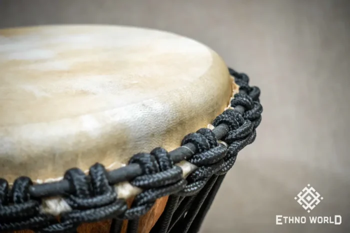 Sun 12″ Djembe – a handmade ethnic percussion drum made of wood with key-tuned leather membrane tension.