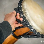 Sun 12″ Djembe – a handmade ethnic percussion drum made of wood with key-tuned leather membrane tension.