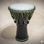 Sun 12″ Djembe – a handmade ethnic percussion drum made of wood with key-tuned leather membrane tension.