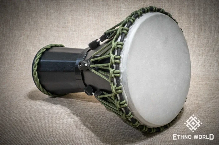 Sun 12″ Djembe – a handmade ethnic percussion drum made of wood with key-tuned leather membrane tension.