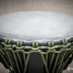 Sun 12″ Djembe – a handmade ethnic percussion drum made of wood with key-tuned leather membrane tension.