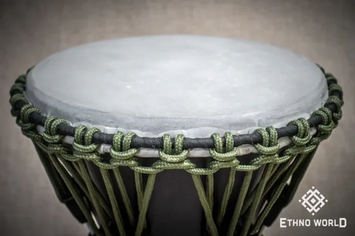 Sun 12″ Djembe – a handmade ethnic percussion drum made of wood with key-tuned leather membrane tension.