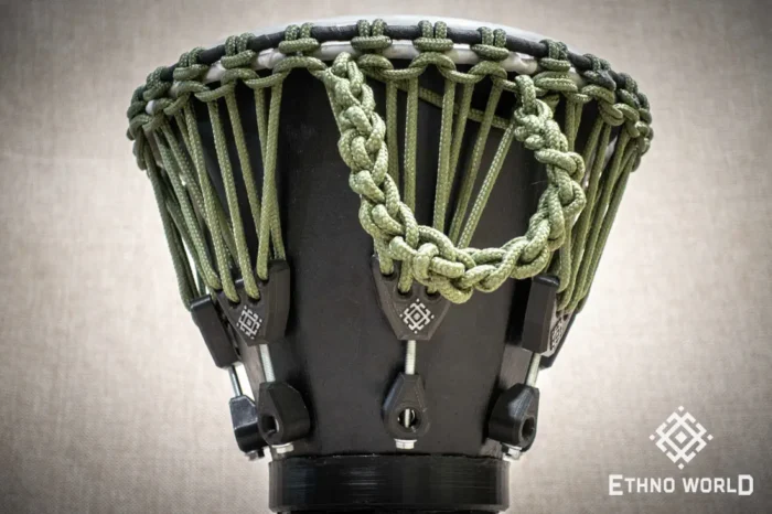 Sun 12″ Djembe – a handmade ethnic percussion drum made of wood with key-tuned leather membrane tension.