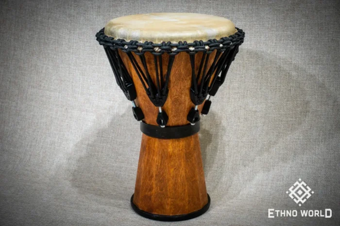 Sun 12″ Djembe – a handmade ethnic percussion drum made of wood with key-tuned leather membrane tension.
