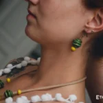 Model wearing handmade green bead necklace