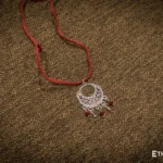 Handmade silver pendant on red cord, Ethno World
