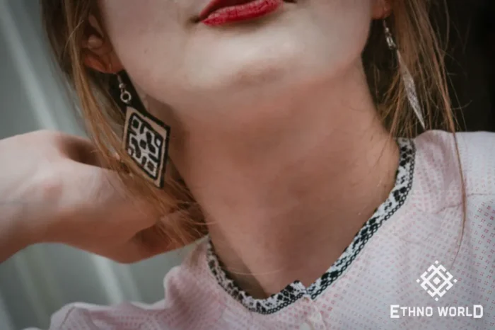 Model wearing handmade silver earrings