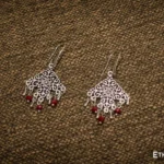 Handmade silver dreamcatcher pendant on red cord