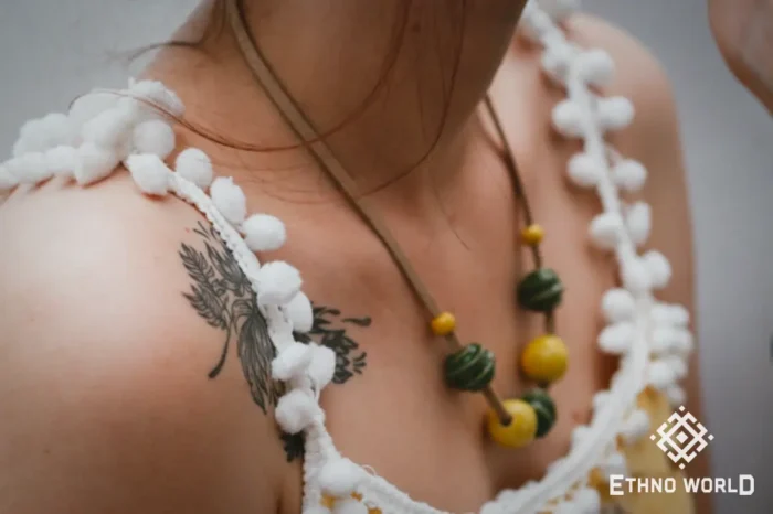 Model wearing handmade green bead necklace