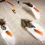 Small handmade dreamcatcher with feathers and wooden beads, hand-woven web, boho wall decor, Ethno World