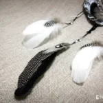 Small ethnic dreamcatcher, woven dream web with natural feathers and beads, rustic home decor, Ethno World