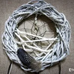 Small handmade dreamcatcher with feathers and wooden beads, hand-woven web, boho wall decor, Ethno World