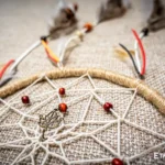 Medium handwoven dreamcatcher with feather and bead details, tribal boho wall hanging, Ethno World