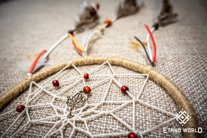 Medium handwoven dreamcatcher with feather and bead details, tribal boho wall hanging, Ethno World