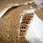 Medium handmade dreamcatcher with feathers and wooden beads, hand-woven web pattern, boho wall decor, Ethno World