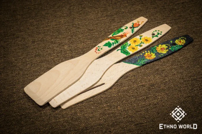 Fan of hand-painted wooden spatulas, traditional Petrykivka floral design, Ethno World