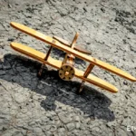 Handcrafted wooden biplane model close-up