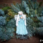 Handmade macramé Christmas decoration, teal and white woven tree design, Ethno World