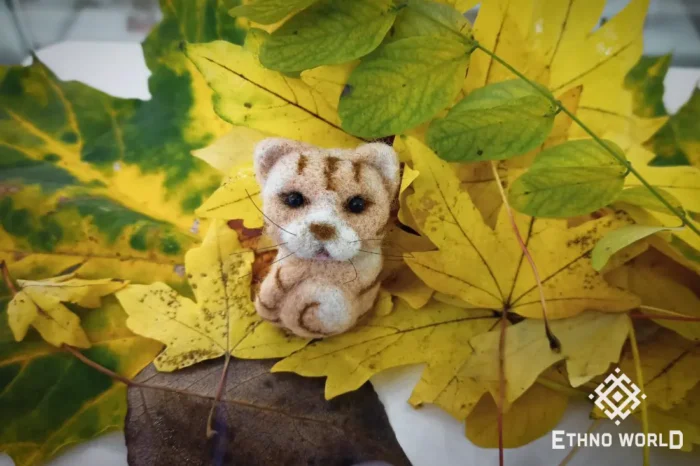 Needle felted kitten with autumn leaves, handmade wool