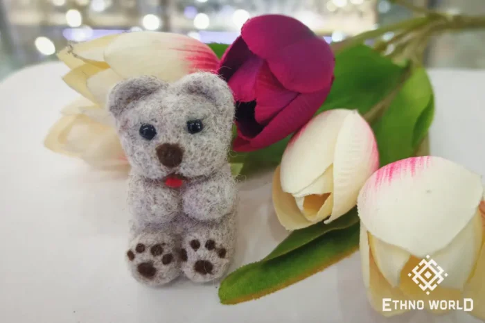 Needle felted teddy bear with flowers, handmade wool
