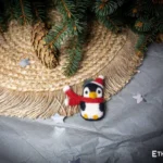 Needle felted small penguin Christmas ornament, handmade wool