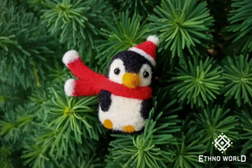Needle felted penguin toy with Santa hat, handmade wool