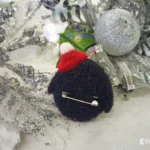 Needle felted penguin brooch with pine branches, handmade wool
